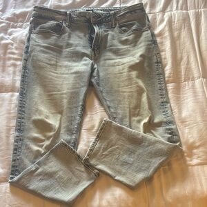 AE AIRFLEX+ Light Wash Slim Straight Jeans